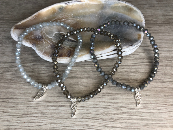 Rondelle glass bead stretch bracelet with sterling silver wing charm