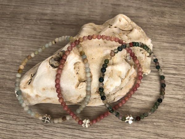 Stone stretch bracelet with sterling silver charm